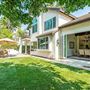 Large Single family suburban home with a spanish style design
