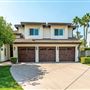 Large Single family suburban home with a spanish style design