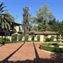 Spanish Home on 3 Acres with Private Pond and Rock Cabin