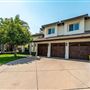 Large Single family suburban home with a spanish style design
