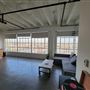 Open Loft Space with Broad Windows