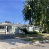 Quaint home with large front and back yard with pool, quite street, easy loading/unloading