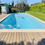 Quaint home with large front and back yard with pool, quite street, easy loading/unloading