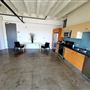 Open Loft Space with Broad Windows