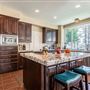 Large Single family suburban home with a spanish style design