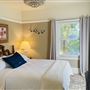 Fully furnished stucco California Bungalow