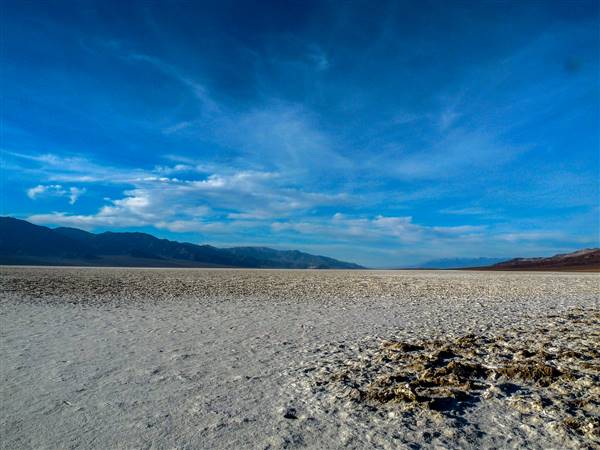 Badwater Basin - Death Valley National Park (1/3/2012 - Credits: "Badwater" by Luc Morandi (CC BY-NC-ND 2.0)[https://creativecommons.org/licenses/by-nc-nd/2.0/legalcode]https://www.flickr.com/photos/68746879@N02/)