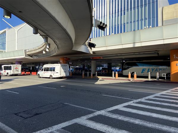 Los Angeles International Airport (LAX) - T1.5 Exterior Arrivals Curb (Exterior & Outer) / Exterior Curb and Baggage Check-n (1/9/2024 - Credits: Michael S. Hoffner)