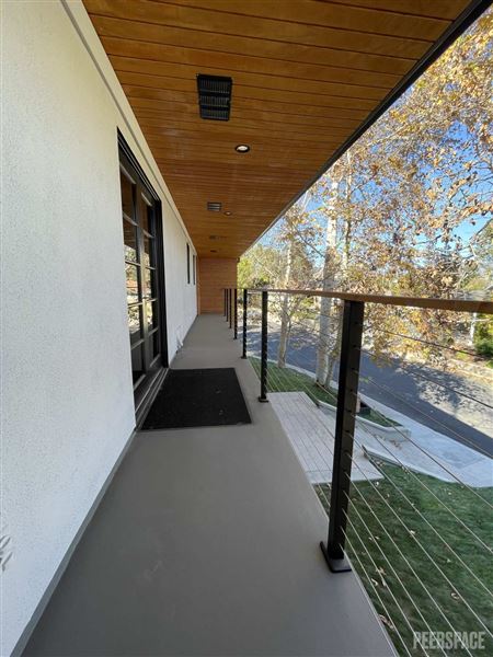 Unique Mid-Century Modern Home on 11,000 SF Corner Lot with Large Swimming Pool (11/22/2024 - Credits: Natalie Tarpinian)