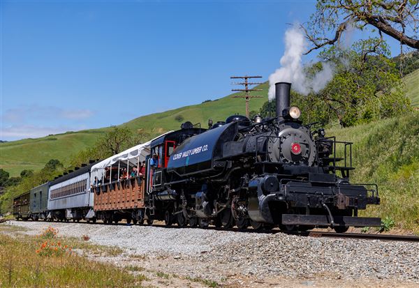 Niles Canyon Railway & Sunol Depot - Steam locomotive, Clover Valley Lumber Co. #4, pulls a Niles Canyon passenger train east along Highway 84 on its way to the museum’s Sunol, CA train station where passengers will disembark after the 1.5 hour round trip train ride through Niles Canyon. (3/18/2026 - Credits: Christopher Hauf – Niles Canyon Railway)
