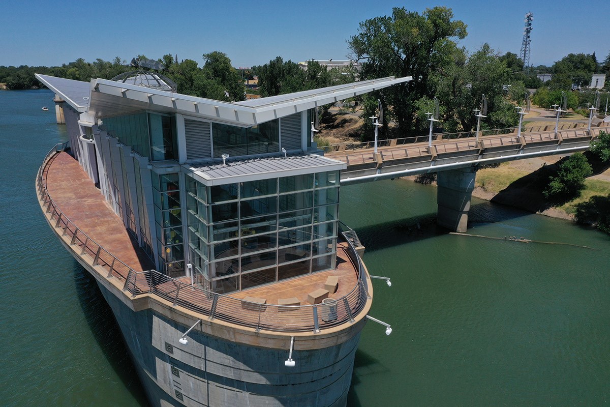 photo of the Sacramento River Water Intake Structure showing architecture that invokes a ship and the broad connecting bridge