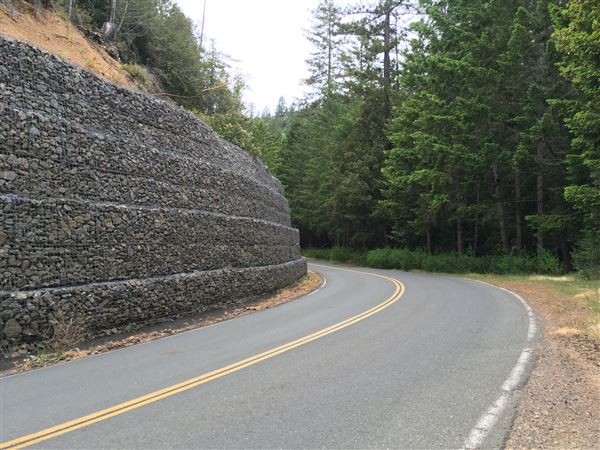 Comptche-Ukiah Road (eastward from Comptche) / aka Orr Springs Road - Comptche Ukiah Road/Orr Springs Road; rock retaining wall, looking westward; around milemarker 24 (5/19/2018 - Credits: Kellen Lim)