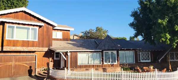 Ranch House Cedar Natural Wood 1960 Diamond Windows (9/14/2024 - Credits: Harry Farrar)