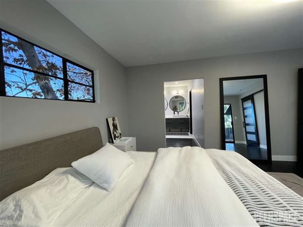 Unique Mid-Century Modern Home on 11,000 SF Corner Lot with Large Swimming Pool (11/22/2024 - Credits: Natalie Tarpinian)