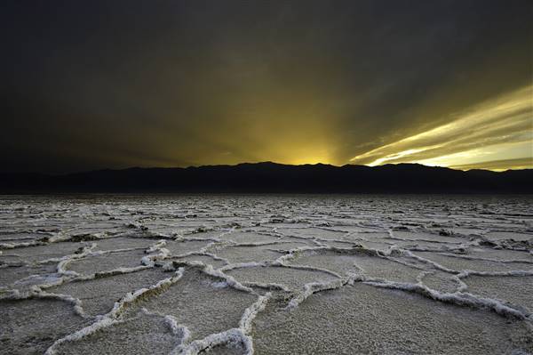 Badwater Basin - Death Valley National Park (3/20/2013 - Credits: "Sunset at Badwater" by Randy Lemoine (CC BY 2.0)[https://creativecommons.org/licenses/by/2.0/legalcode]https://www.flickr.com/photos/19942094@N00/)