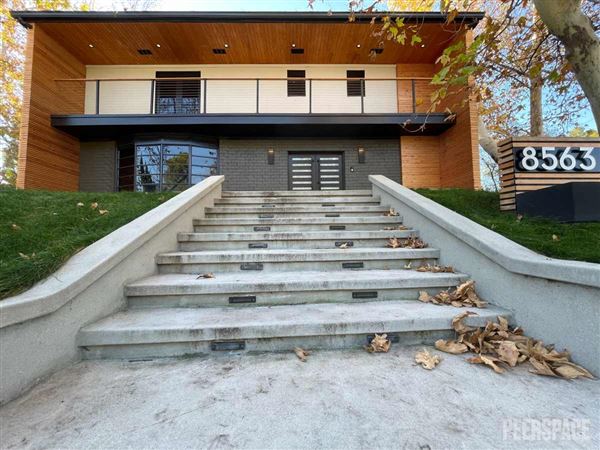 Unique Mid-Century Modern Home on 11,000 SF Corner Lot with Large Swimming Pool (11/22/2024 - Credits: Natalie Tarpinian)