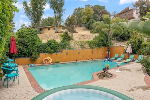 Large Ranch Style House with POOL & KOI POND (8/22/2024 - Credits: Drew DiFonzo Marks)