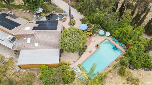 Large Ranch Style House with POOL & KOI POND (8/22/2024 - Credits: Drew DiFonzo Marks)