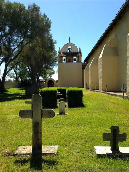 Mission Santa Ines (6/27/2014 - Credits: "Mission Santa Ines graveyard" by (CC BY 2.0)[https://creativecommons.org/licenses/by/2.0/legalcode]https://www.flickr.com/photos/bdearth/)