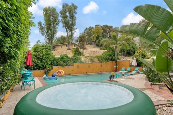 Large Ranch Style House with POOL & KOI POND (8/22/2024 - Credits: Drew DiFonzo Marks)