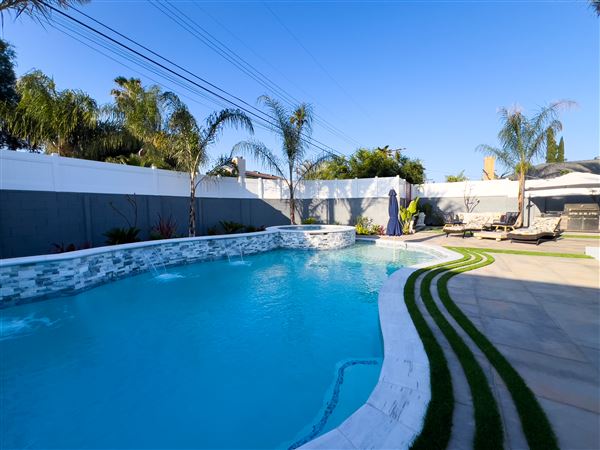 The Pink Lotus (Home w/ Modern Interior & Tropical Oasis Exterior) (7/1/2024 - Credits: Jennifer Chadbourne and Tray Photography)