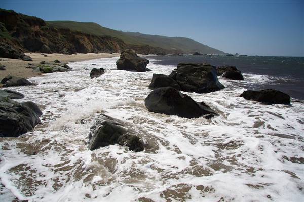Andrew Molera State Park (SP) (5/12/2009 - Credits: "In the surf, Andrew Molera State Park" by Gary Denham (CC BY-ND 2.0)[https://creativecommons.org/licenses/by-nd/2.0/legalcode] https://www.flickr.com/photos/garyjd/)