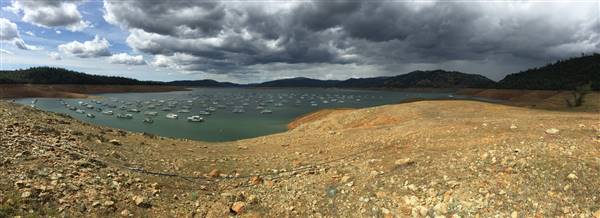 Lake Oroville State Recreation Area (SRA) (4/25/2015 - Credits: "California Drought, Lake Oroville State Recreation Area #clouds #panorama" by Ray Bouknight (CC BY 2.0)[https://creativecommons.org/licenses/by/2.0/legalcode]https://www.flickr.com/photos/raybouk/)